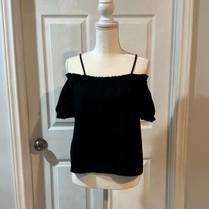 H & M black off-shoulder strap top. XS Pre-owned. Small discoloration sp…